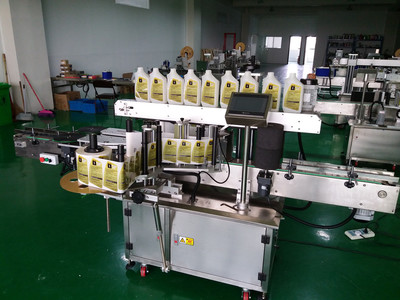 促銷(xiāo)全自動(dòng)定位圓瓶貼標(biāo)機(jī)